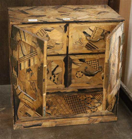 A Japanese parquetry chest/cabinet W.54cm